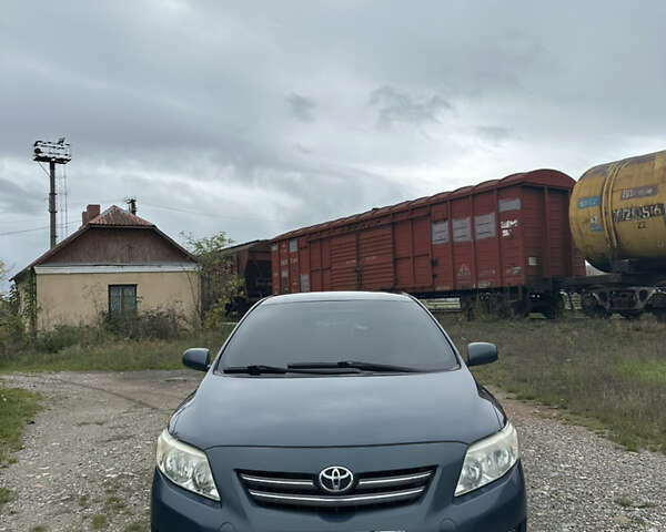 Синій Тойота Королла, об'ємом двигуна 1.6 л та пробігом 239 тис. км за 6900 $, фото 5 на Automoto.ua