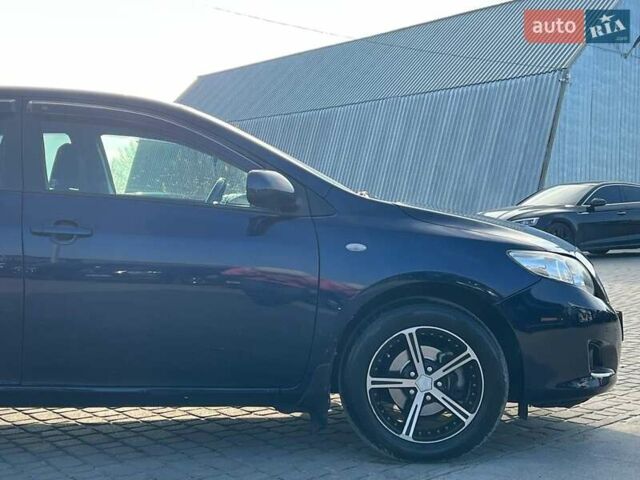 Синій Тойота Королла, об'ємом двигуна 1.6 л та пробігом 198 тис. км за 8690 $, фото 9 на Automoto.ua