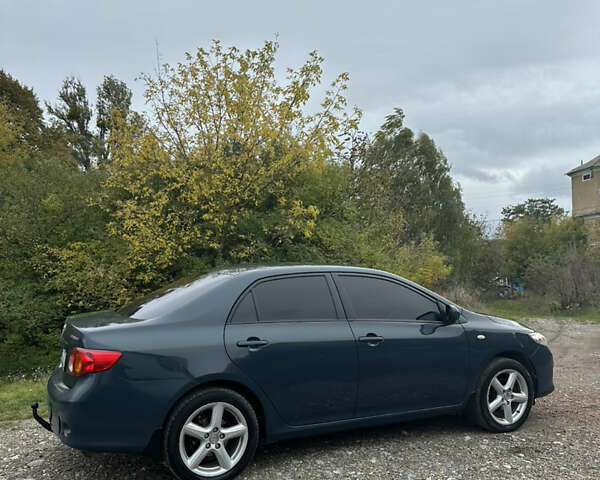 Синій Тойота Королла, об'ємом двигуна 1.6 л та пробігом 239 тис. км за 6900 $, фото 16 на Automoto.ua