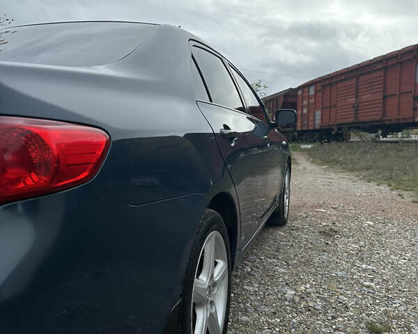 Синій Тойота Королла, об'ємом двигуна 1.6 л та пробігом 239 тис. км за 6900 $, фото 15 на Automoto.ua