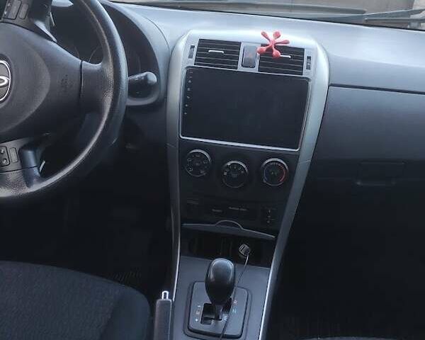 Тойота Королла 2008 в Львове на Automoto.ua Синий Тойота Королла, объемом двигателя 1.6 л и пробегом 238 тыс. км за 7400 $, фото 6 на Automoto.ua