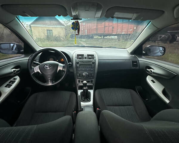 Синій Тойота Королла, об'ємом двигуна 1.6 л та пробігом 239 тис. км за 6900 $, фото 17 на Automoto.ua