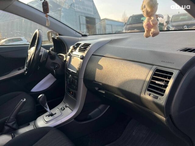 Синий Тойота Королла, объемом двигателя 1.6 л и пробегом 198 тыс. км за 8690 $, фото 37 на Automoto.ua