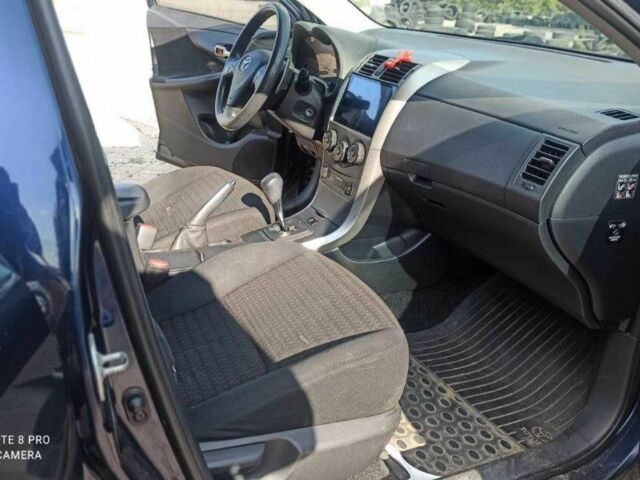Синій Тойота Королла, об'ємом двигуна 1.6 л та пробігом 239 тис. км за 6900 $, фото 7 на Automoto.ua
