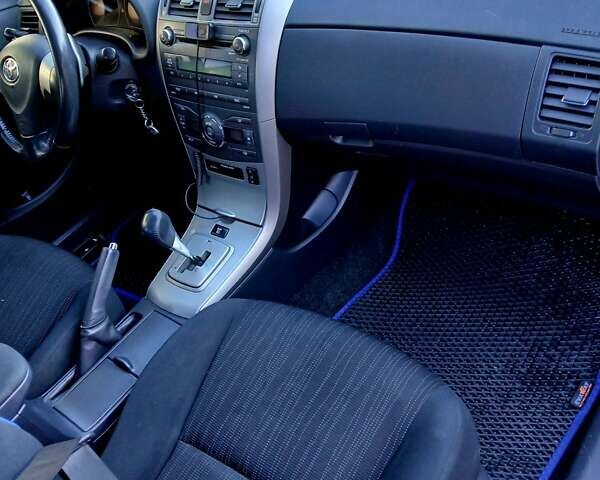 Синий Тойота Королла, объемом двигателя 1.6 л и пробегом 240 тыс. км за 7099 $, фото 11 на Automoto.ua