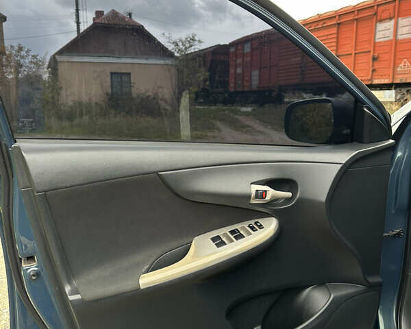 Синій Тойота Королла, об'ємом двигуна 1.6 л та пробігом 239 тис. км за 6900 $, фото 20 на Automoto.ua