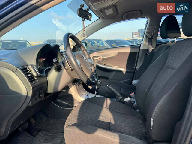 Синій Тойота Королла, об'ємом двигуна 1.6 л та пробігом 198 тис. км за 8690 $, фото 17 на Automoto.ua