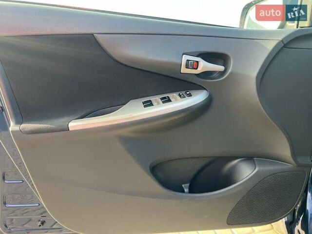 Синій Тойота Королла, об'ємом двигуна 1.6 л та пробігом 198 тис. км за 8690 $, фото 13 на Automoto.ua