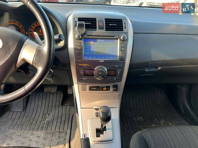 Синій Тойота Королла, об'ємом двигуна 1.6 л та пробігом 198 тис. км за 8690 $, фото 26 на Automoto.ua