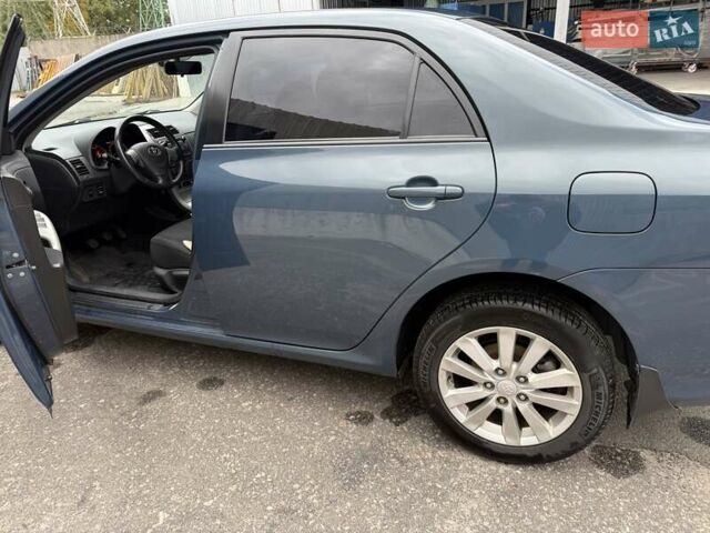 Синий Тойота Королла, объемом двигателя 1.6 л и пробегом 235 тыс. км за 7500 $, фото 1 на Automoto.ua