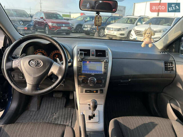 Синій Тойота Королла, об'ємом двигуна 1.6 л та пробігом 198 тис. км за 8690 $, фото 35 на Automoto.ua
