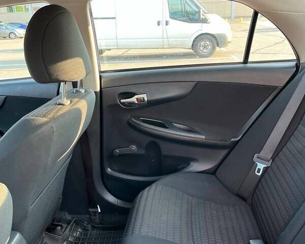 Синий Тойота Королла, объемом двигателя 1.33 л и пробегом 82 тыс. км за 7500 $, фото 28 на Automoto.ua