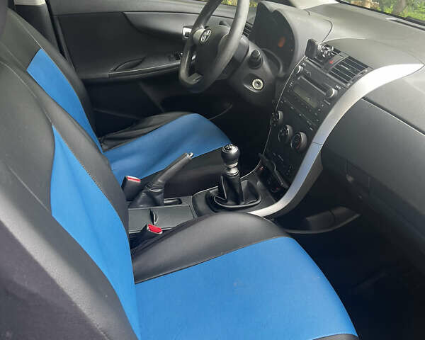 Синий Тойота Королла, объемом двигателя 1.33 л и пробегом 259 тыс. км за 6750 $, фото 10 на Automoto.ua