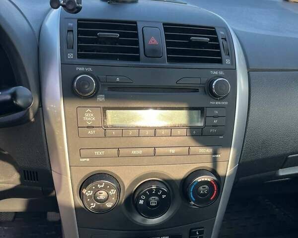 Синий Тойота Королла, объемом двигателя 1.33 л и пробегом 82 тыс. км за 7500 $, фото 22 на Automoto.ua