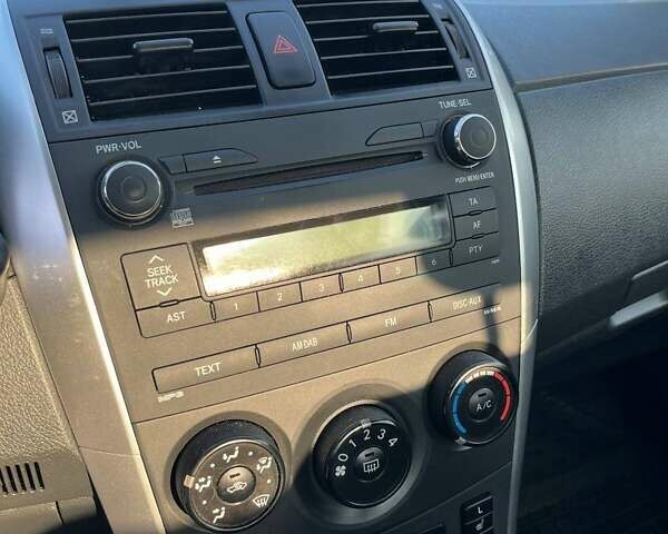 Синий Тойота Королла, объемом двигателя 1.33 л и пробегом 82 тыс. км за 7500 $, фото 23 на Automoto.ua