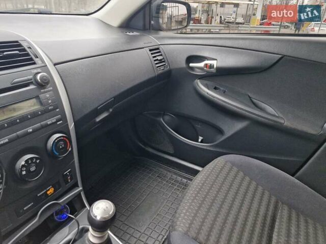 Синий Тойота Королла, объемом двигателя 1.3 л и пробегом 160 тыс. км за 7499 $, фото 22 на Automoto.ua