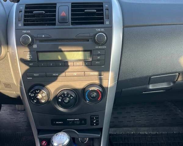 Синий Тойота Королла, объемом двигателя 1.33 л и пробегом 82 тыс. км за 7500 $, фото 12 на Automoto.ua