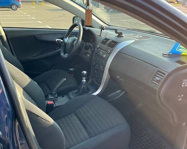 Синий Тойота Королла, объемом двигателя 1.33 л и пробегом 82 тыс. км за 7500 $, фото 21 на Automoto.ua