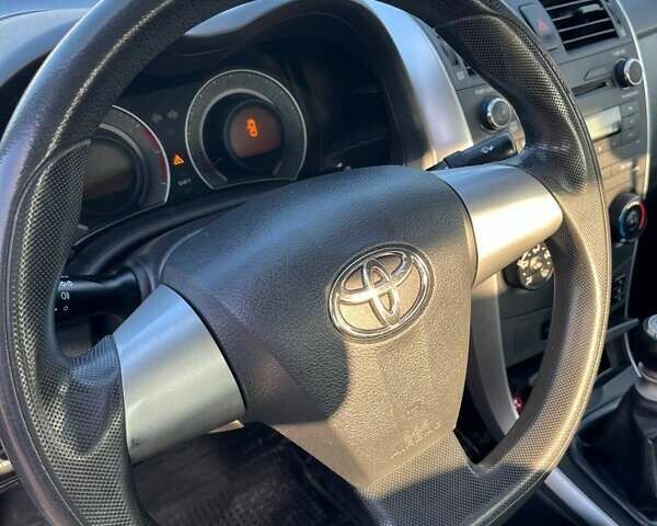 Синий Тойота Королла, объемом двигателя 1.33 л и пробегом 82 тыс. км за 7500 $, фото 18 на Automoto.ua