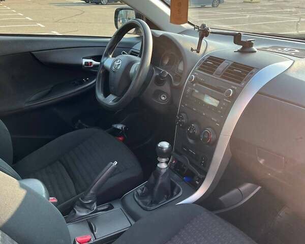 Синий Тойота Королла, объемом двигателя 1.33 л и пробегом 82 тыс. км за 7500 $, фото 20 на Automoto.ua