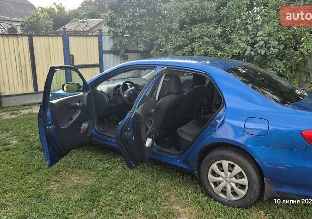 Синий Тойота Королла, объемом двигателя 1.33 л и пробегом 189 тыс. км за 7500 $, фото 6 на Automoto.ua