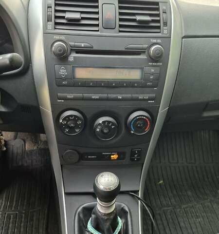 Синий Тойота Королла, объемом двигателя 1.33 л и пробегом 189 тыс. км за 7500 $, фото 15 на Automoto.ua