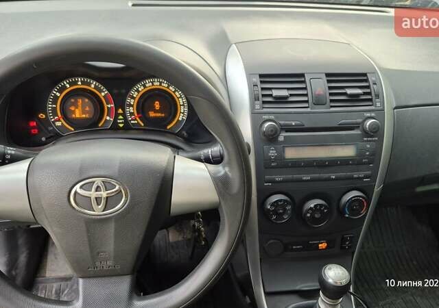 Синий Тойота Королла, объемом двигателя 1.33 л и пробегом 189 тыс. км за 7500 $, фото 10 на Automoto.ua