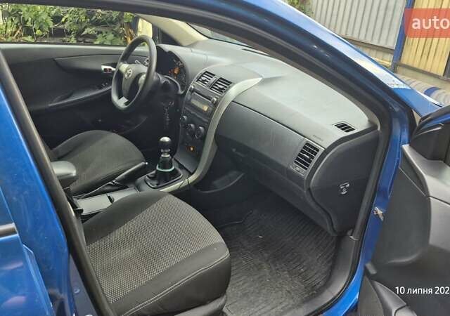 Синий Тойота Королла, объемом двигателя 1.33 л и пробегом 189 тыс. км за 7500 $, фото 12 на Automoto.ua