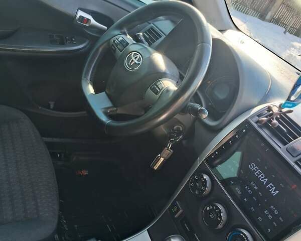 Синій Тойота Королла, об'ємом двигуна 1.6 л та пробігом 219 тис. км за 10500 $, фото 10 на Automoto.ua