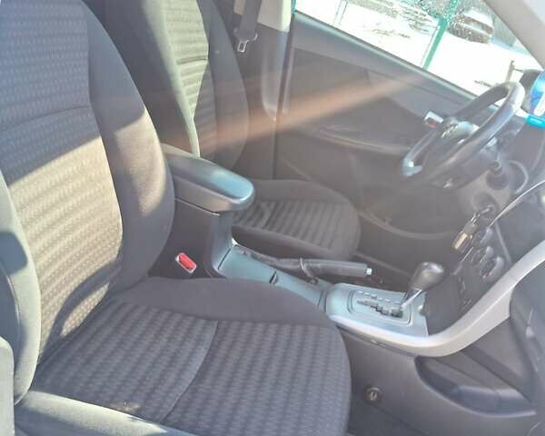 Синій Тойота Королла, об'ємом двигуна 1.6 л та пробігом 219 тис. км за 10500 $, фото 13 на Automoto.ua