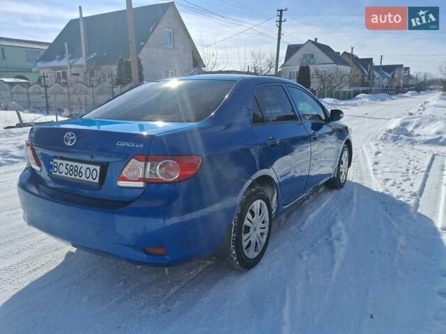 Синій Тойота Королла, об'ємом двигуна 1.6 л та пробігом 219 тис. км за 10500 $, фото 7 на Automoto.ua