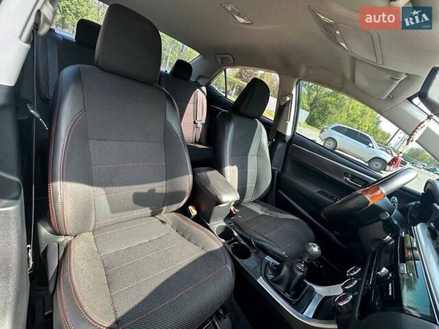 Синий Тойота Королла, объемом двигателя 1.33 л и пробегом 66 тыс. км за 13500 $, фото 14 на Automoto.ua