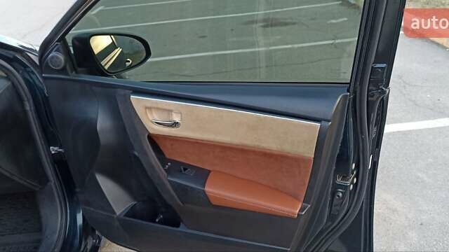 Синій Тойота Королла, об'ємом двигуна 1.8 л та пробігом 117 тис. км за 14000 $, фото 14 на Automoto.ua