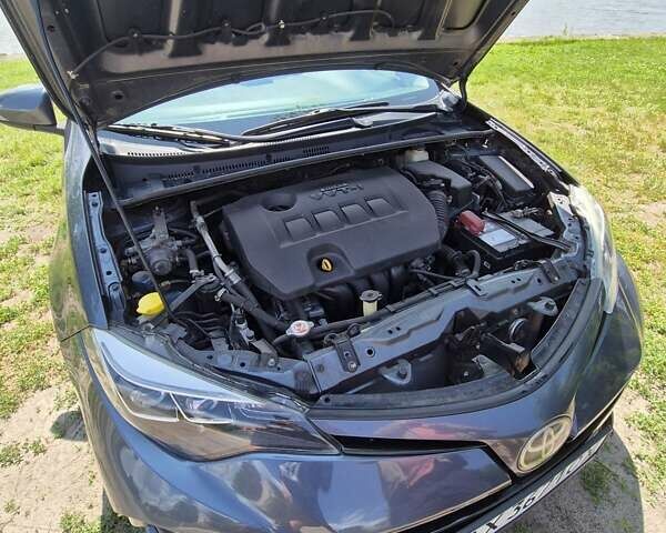 Синий Тойота Королла, объемом двигателя 1.8 л и пробегом 228 тыс. км за 12450 $, фото 20 на Automoto.ua