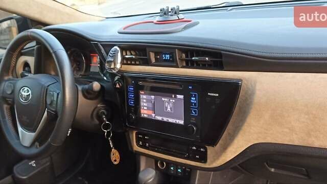 Синій Тойота Королла, об'ємом двигуна 1.8 л та пробігом 117 тис. км за 14000 $, фото 17 на Automoto.ua