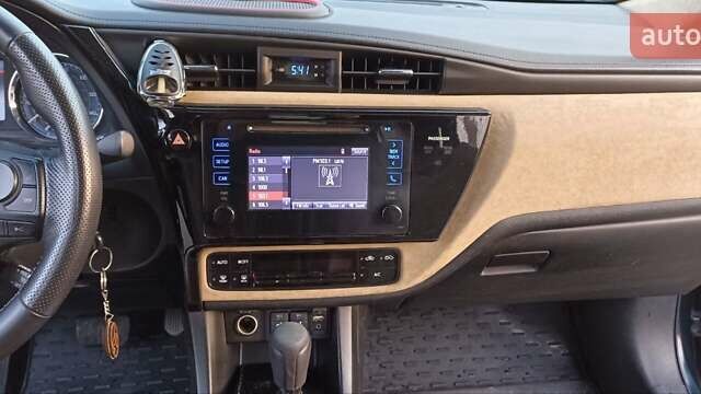 Синій Тойота Королла, об'ємом двигуна 1.8 л та пробігом 117 тис. км за 14000 $, фото 27 на Automoto.ua