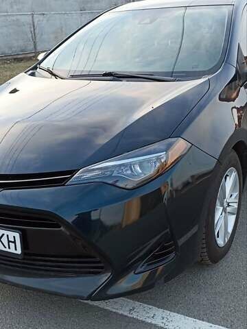 Синій Тойота Королла, об'ємом двигуна 1.8 л та пробігом 117 тис. км за 14000 $, фото 11 на Automoto.ua