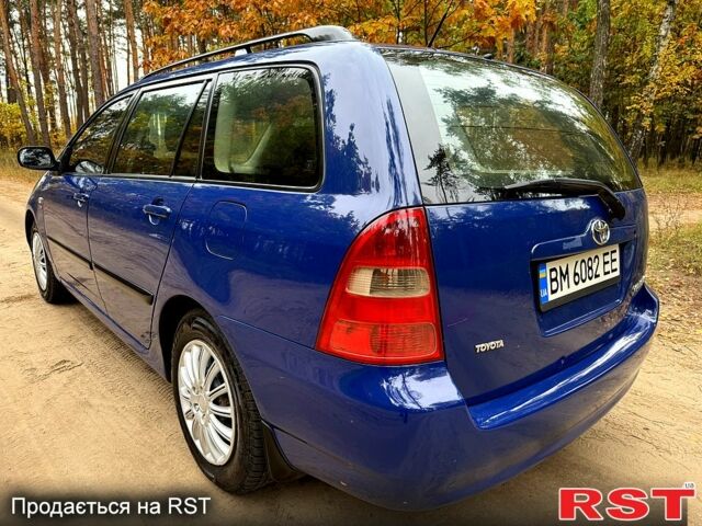 Синий Тойота Королла, объемом двигателя 1.4 л и пробегом 200 тыс. км за 3950 $, фото 4 на Automoto.ua