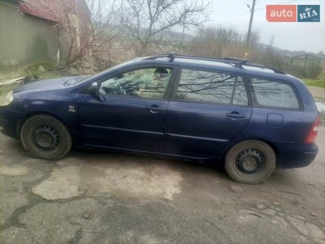 Синій Тойота Королла, об'ємом двигуна 2 л та пробігом 410 тис. км за 3600 $, фото 2 на Automoto.ua