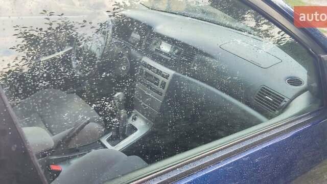 Синий Тойота Королла, объемом двигателя 1.6 л и пробегом 256 тыс. км за 4400 $, фото 2 на Automoto.ua