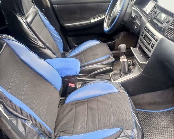 Синій Тойота Королла, об'ємом двигуна 2 л та пробігом 410 тис. км за 3600 $, фото 5 на Automoto.ua