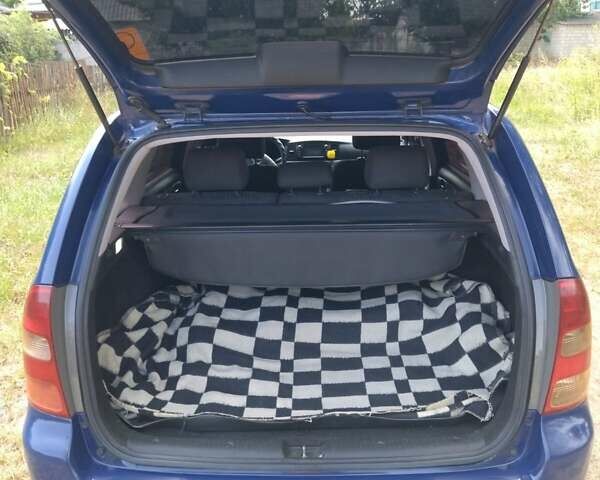 Синий Тойота Королла, объемом двигателя 2 л и пробегом 247 тыс. км за 4800 $, фото 2 на Automoto.ua