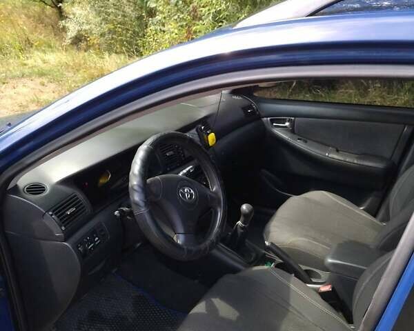 Синий Тойота Королла, объемом двигателя 2 л и пробегом 247 тыс. км за 4800 $, фото 4 на Automoto.ua