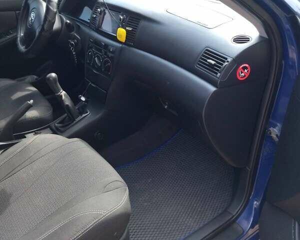 Синий Тойота Королла, объемом двигателя 2 л и пробегом 247 тыс. км за 4800 $, фото 12 на Automoto.ua