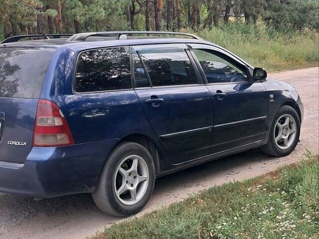 Синий Тойота Королла, объемом двигателя 2 л и пробегом 380 тыс. км за 4100 $, фото 7 на Automoto.ua