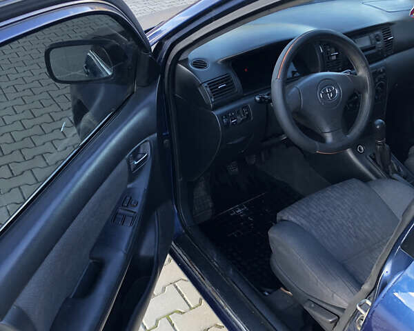 Синій Тойота Королла, об'ємом двигуна 2 л та пробігом 508 тис. км за 3900 $, фото 6 на Automoto.ua