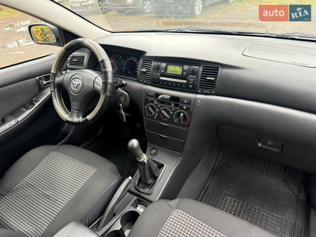 Синий Тойота Королла, объемом двигателя 2 л и пробегом 278 тыс. км за 2300 $, фото 12 на Automoto.ua