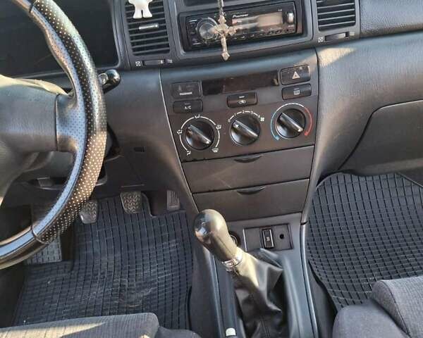 Синий Тойота Королла, объемом двигателя 1.36 л и пробегом 300 тыс. км за 3800 $, фото 13 на Automoto.ua