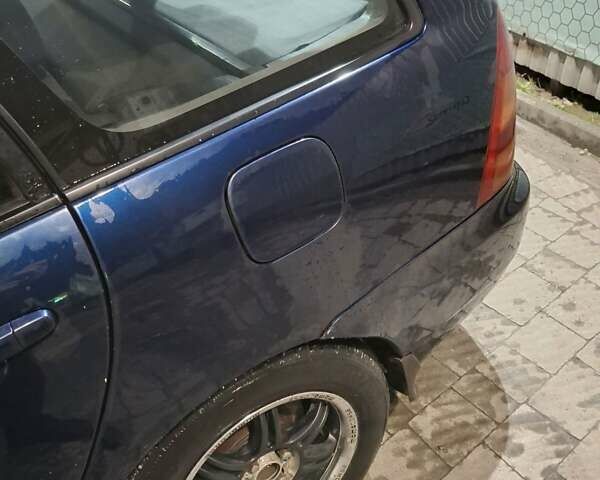 Синий Тойота Королла, объемом двигателя 1.36 л и пробегом 300 тыс. км за 3800 $, фото 1 на Automoto.ua