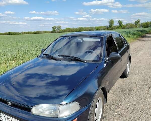 Синий Тойота Королла, объемом двигателя 2 л и пробегом 320 тыс. км за 2000 $, фото 10 на Automoto.ua